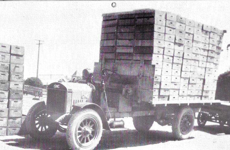 Peach boxes on truck